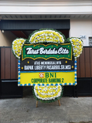 Papan Bunga Duka di Beo