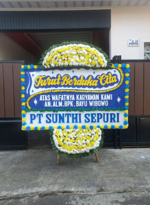 Papan Bunga Duka di Beo