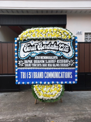 Papan Bunga Duka di Beo